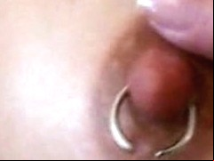 Horny chick plays with her tits