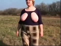 Giant mounds of my peasant large delightful woman wife outdoors flashing